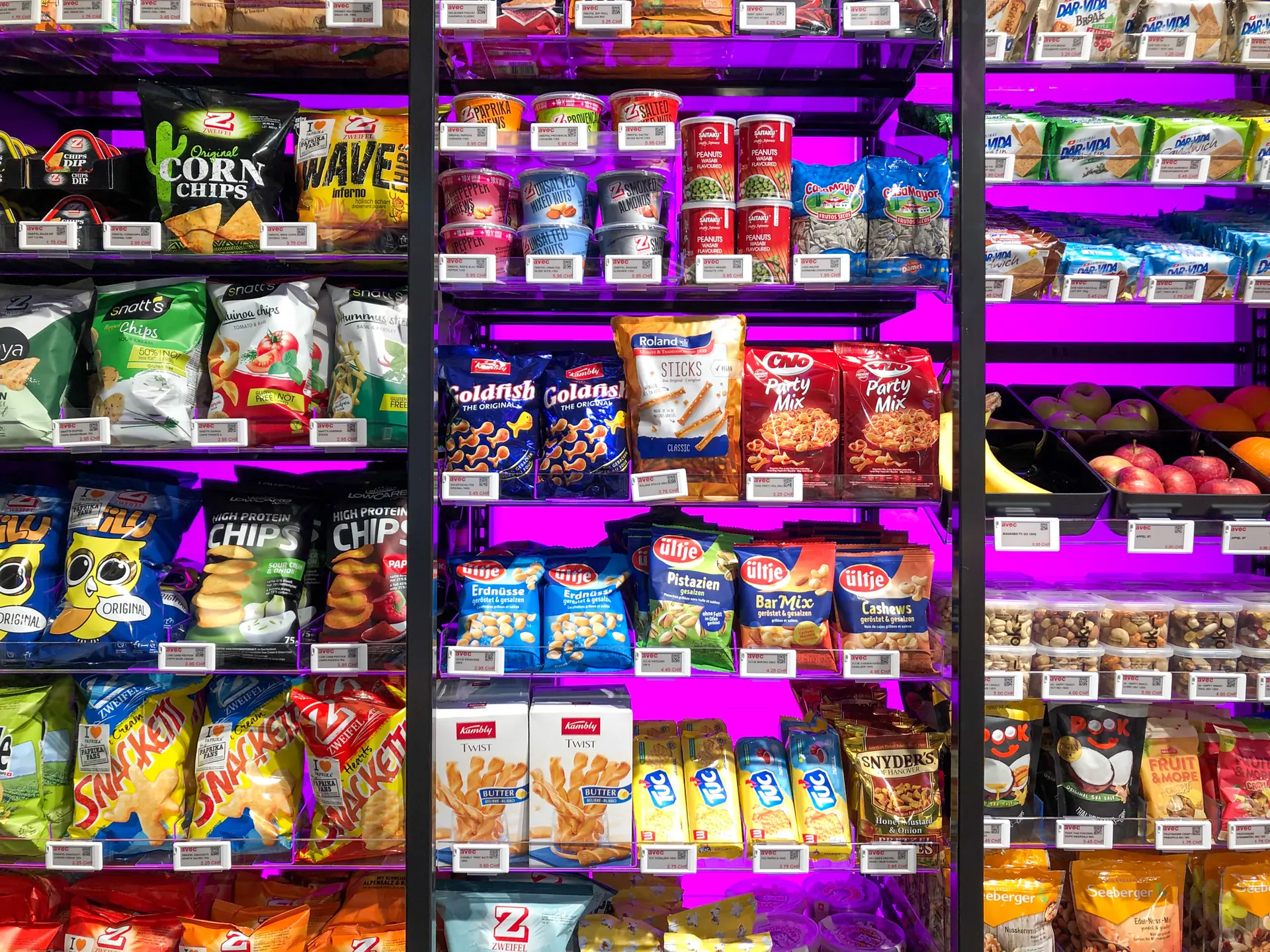 Shelves stocked with chips and snacks