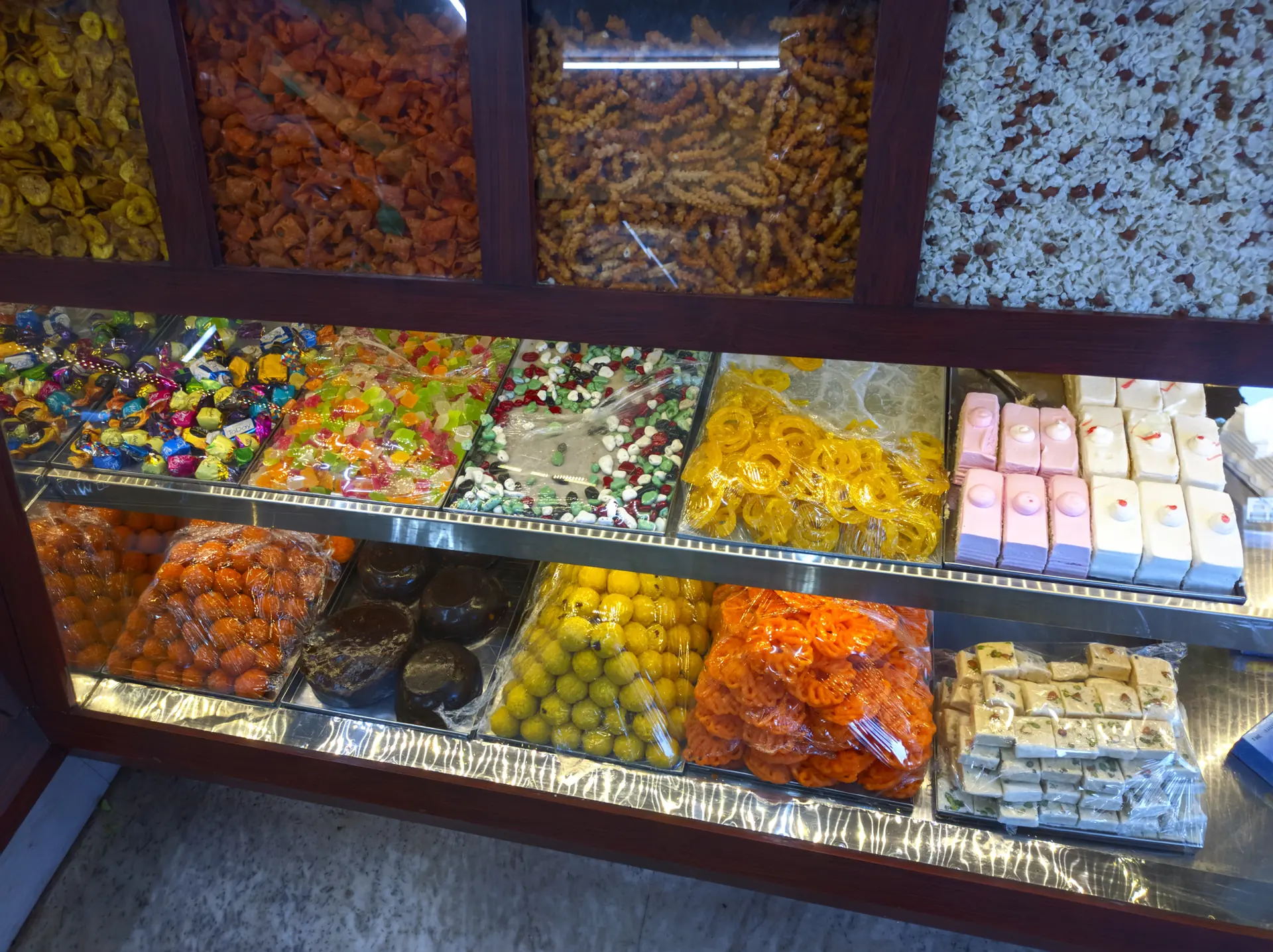 Sweet shop counter filled with colourful treats